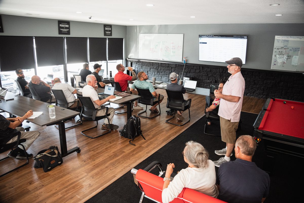 The second-floor room filling up before a GEMS session